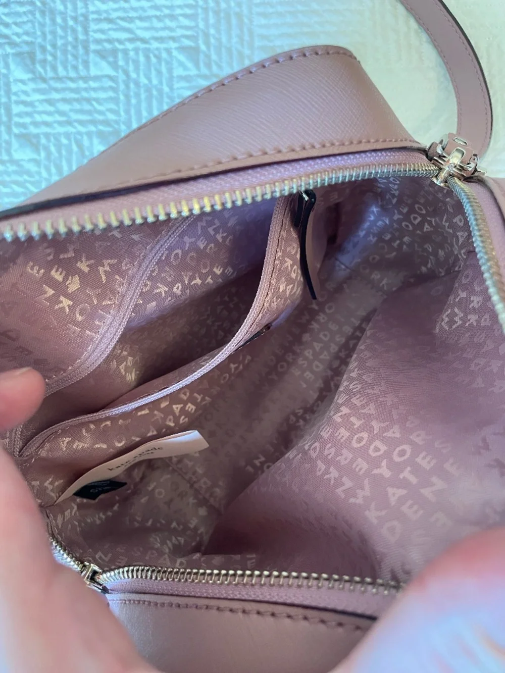 Kate Spade Newbury Lane Cammie crossbody bag in dusty peony pink